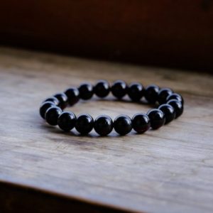 Vòng Hổ Phách Đen Ánh Đỏ Baltic Tròn 11 Ly